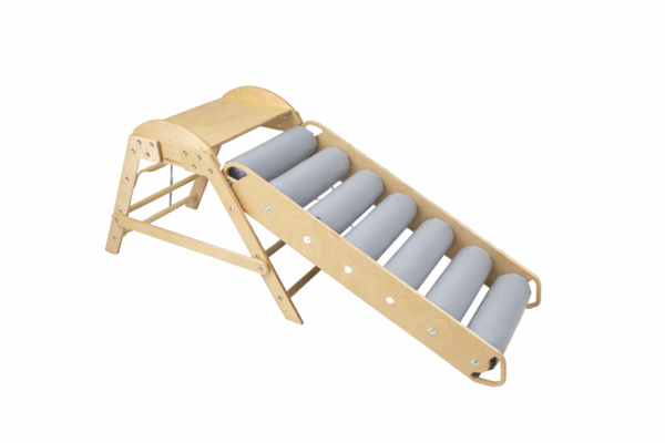 Simedica.pl20rampa20zjec5bcdc5bcalnia20roller20do20integracji20sensorycznej20mac582a20szara.png Rampa ROLLER szara, zjeżdżalnia rolkowa z siedmioma obrotowymi wałkami